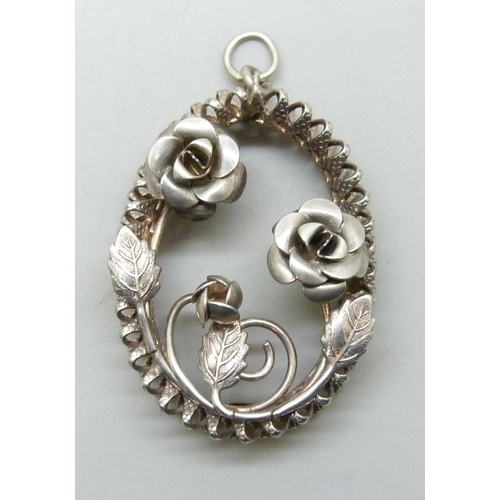 7244 - A silver floral design necklace pendant, marked Beau Sterling, 11g, 5.3cm including bail