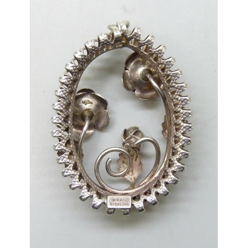 7244 - A silver floral design necklace pendant, marked Beau Sterling, 11g, 5.3cm including bail