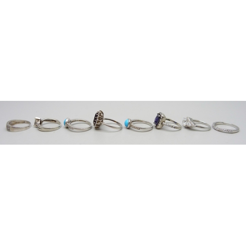 7249 - Eight stone set silver rings, 26g