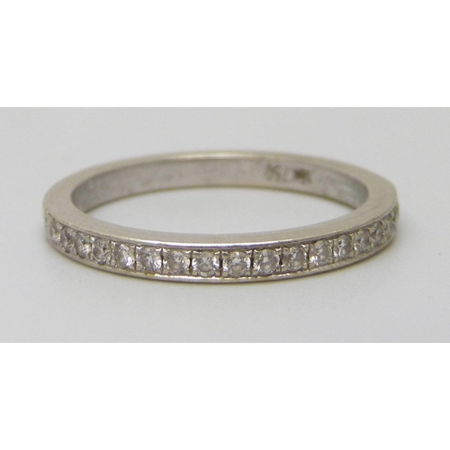 7268 - An 18ct white gold and diamond half eternity ring, 2.9g, M