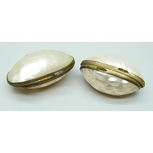 7271 - Two 19th Century gilt metal and mother of pearl thimble holders, 4.8cm largest, one with hole