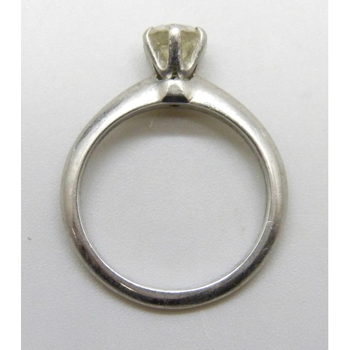 7279 - A Tiffany & Co. platinum solitaire ring set with a round brilliant cut 0.82ct diamond, colour grade ... 