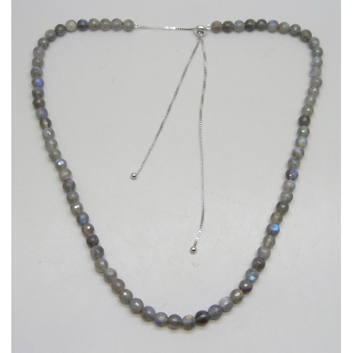 7288 - A 105.50ct Canadian Labradorite silver slider necklace, 27g, with certificate