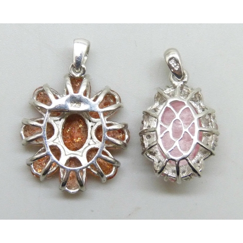 7290 - Two sterling silver pendants rhodochrosite, 5.97ct, and a white topaz and Tanzanian sunstone pendant... 