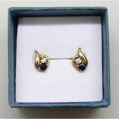 7291 - A pair of yellow metal stone set earrings, the posts marked CZ, 1g