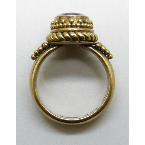 7297 - A Suarti silver gilt amethyst ring, M