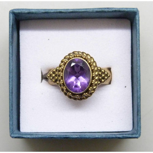 7297 - A Suarti silver gilt amethyst ring, M