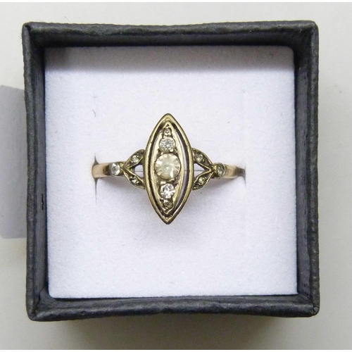 7299 - A marquise shape ring, the shank 9ct with an attached gilt metal replacement setting area, 2.2g, P