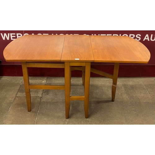 14 - A teak drop-leaf table
