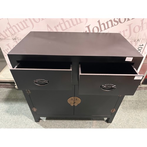 3011 - A black painted two drawer two door cabinet