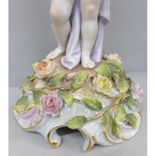 2014 - An early 20th century Schierholz porcelain figural candlestick, 28cm, a/f