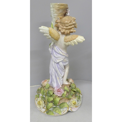 2014 - An early 20th century Schierholz porcelain figural candlestick, 28cm, a/f