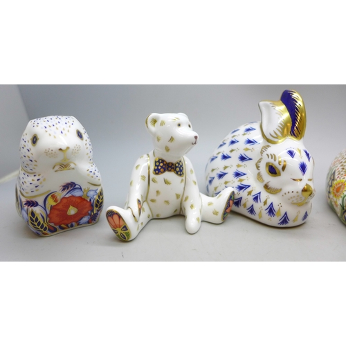 A collection of six Royal Crown Derby paperweight figures to include ...