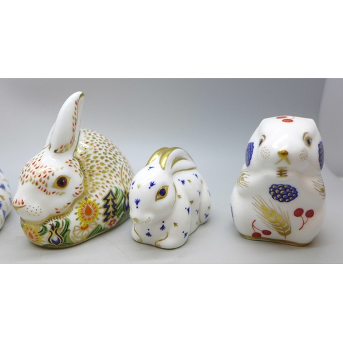 A collection of six Royal Crown Derby paperweight figures to include ...