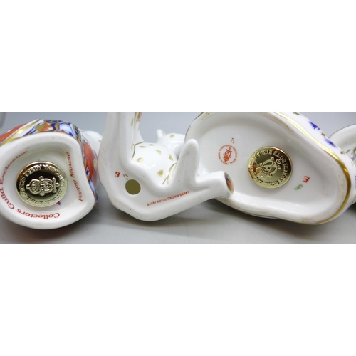 A collection of six Royal Crown Derby paperweight figures to include ...