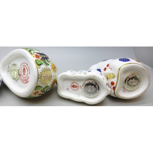A collection of six Royal Crown Derby paperweight figures to include ...