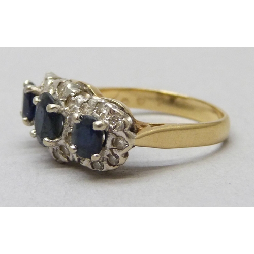 7016 - An 18ct gold, sapphire and diamond ring, stones a/f, 5.1g, L