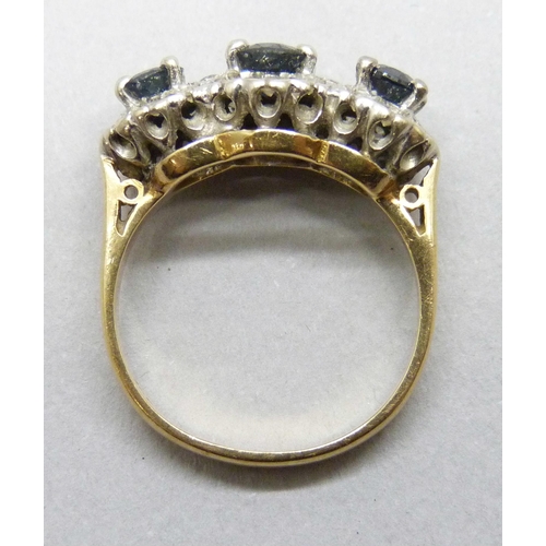 7016 - An 18ct gold, sapphire and diamond ring, stones a/f, 5.1g, L