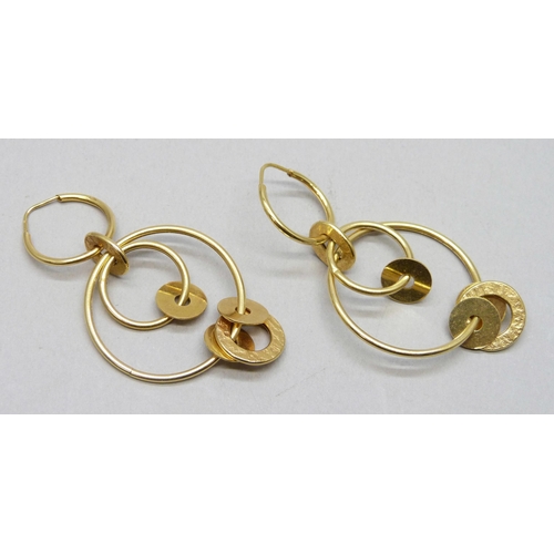 7043 - A pair of 9ct gold circle drop earrings with textured finish, 6.3g, 6.2cm drop