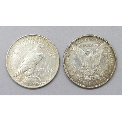 7316 - A 1922 liberty dollar, and an 1888 one dollar coin
