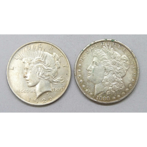 7316 - A 1922 liberty dollar, and an 1888 one dollar coin