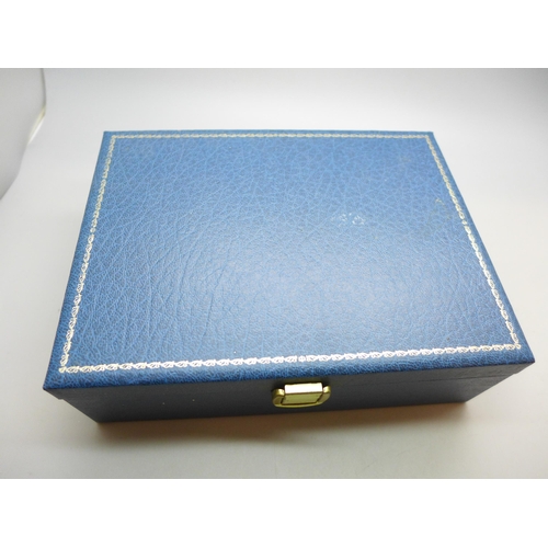 7337 - A silver mounted three piece brush/comb set, boxed