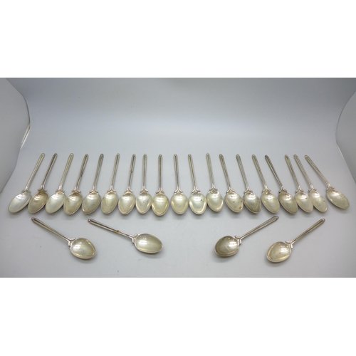 7340 - A set of twenty three silver golf spoons, mainly by Walker & Hall, different years, 270g