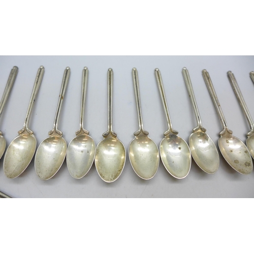 7340 - A set of twenty three silver golf spoons, mainly by Walker & Hall, different years, 270g