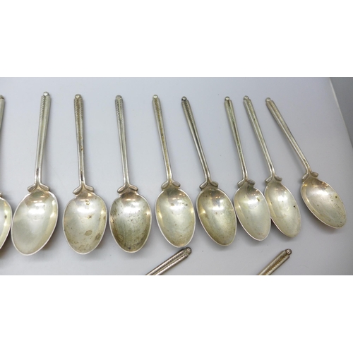 7340 - A set of twenty three silver golf spoons, mainly by Walker & Hall, different years, 270g