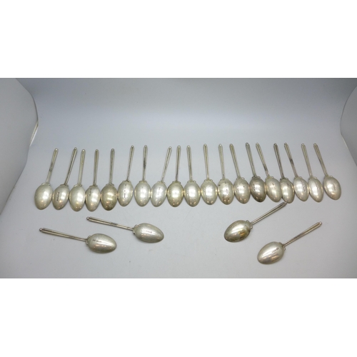 7340 - A set of twenty three silver golf spoons, mainly by Walker & Hall, different years, 270g