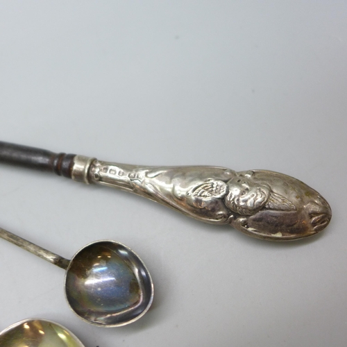 7343 - Nine pieces of silver including a Victorian jug, a pot with embossed figures to lid, an egg cup, a s... 