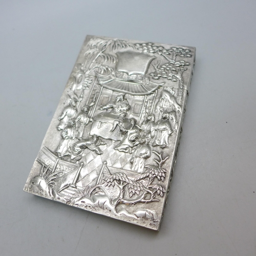 7351 - A Chinese embossed silver card case, control marks to base, 81g, 10.5 x 7.2cm