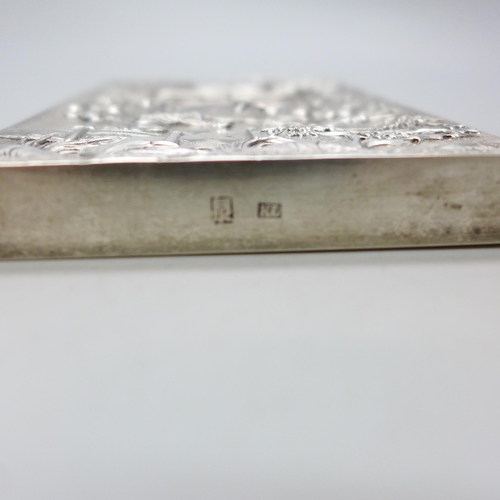 7351 - A Chinese embossed silver card case, control marks to base, 81g, 10.5 x 7.2cm