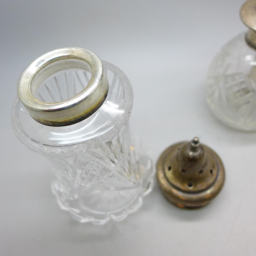 7358 - A cut glass sugar caster with a silver top, silver 18g, and a scent bottle with silver top, a/f