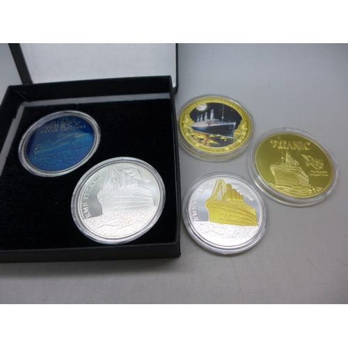 7330 - Coins - The Titanic, a set of five medallions in colour, gold, silver and blue, each medal shows the... 