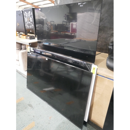 6384 - Quantity of broken/damaged televisions including Hisense 70