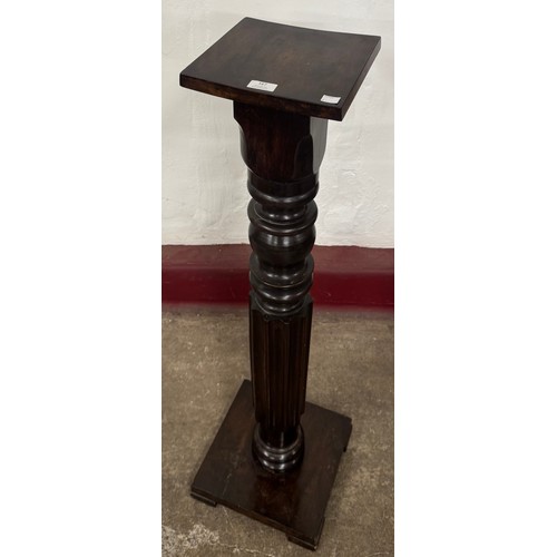 167 - An 18th Century style mahogany torchere