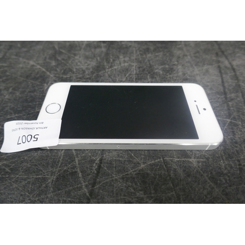5007 - An apple iphone 5s with charging cable and a nokia mobile phone