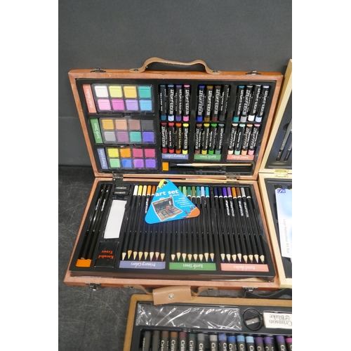 5009 - Five art sets in wooden cases
