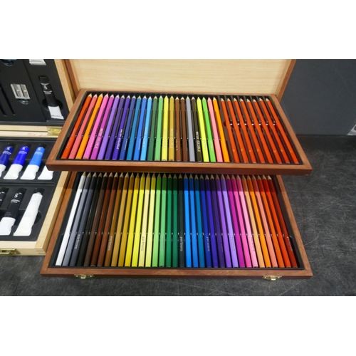 5009 - Five art sets in wooden cases