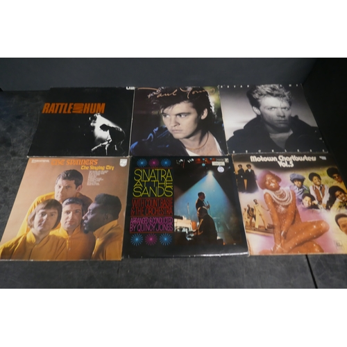 5016 - A quantity of assorted records including Motown Chartbusters, U2, David Essex, etc.