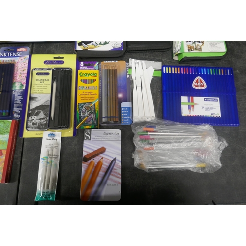 5033 - A collection of artists materials and tools including practice paper pad, sketchpad, pencils, pastel... 