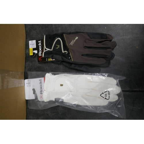 5039 - A large quantity of Roeckl grip gloves in assorted colours