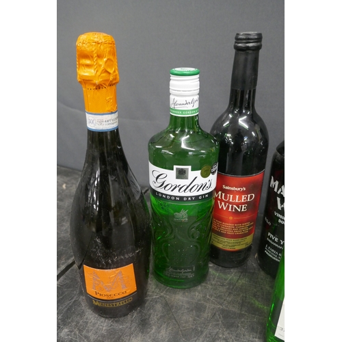 5043 - A quantity of assorted alcohol including Gordon's, London Gin, French Revolution, etc.