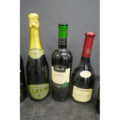 5043 - A quantity of assorted alcohol including Gordon's, London Gin, French Revolution, etc.