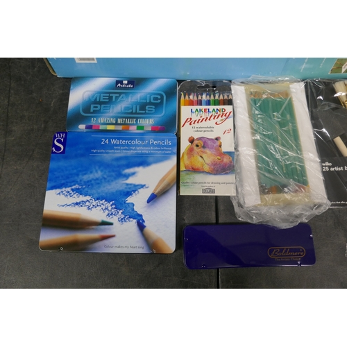 5063 - A collection of assorted art materials and accessories including brushes, watercolour pencil etc.
