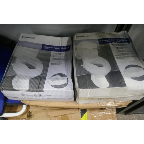 5064 - A quantity of assorted disability aid items including toilet seats, overbed table, bathroom stool, e... 