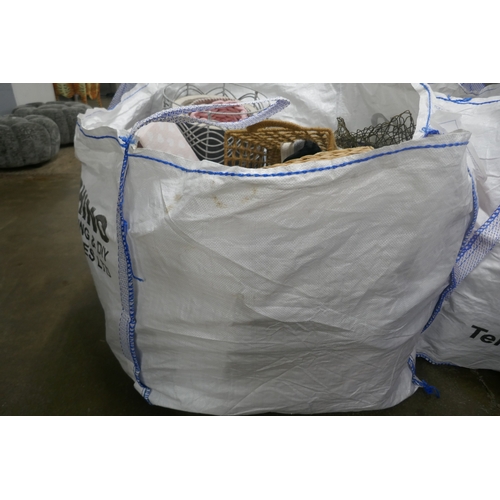 5070 - A large ton bag of assorted laundry bags and baskets