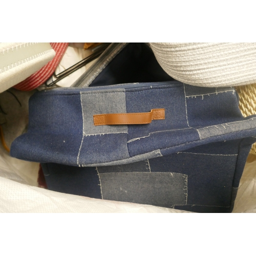 5071 - A large ton bag of assorted laundry bags and baskets