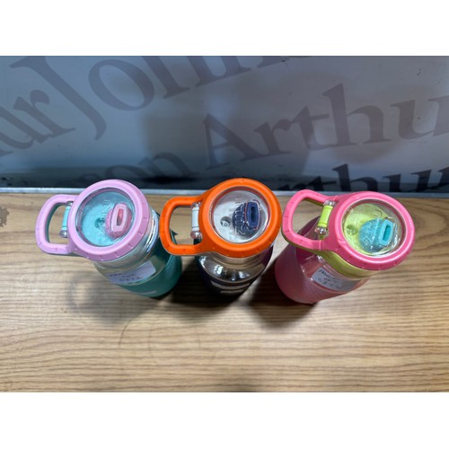 6372 - Three Zulu water bottles, (372-267) *This lot is subject to VAT